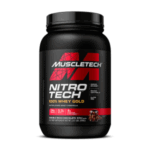 Suplemento proteico MuscleTech NitroTech 100% Whey Gold en envase negro. Contiene 26 gramos de proteína por porción y es ideal para apoyar el desarrollo muscular. Sabor a chocolate doble rico, formulado con ingredientes de alta calidad para mejorar el rendimiento en el entrenamiento. Perfecto para atletas y entusiastas del fitness que buscan una fuente de proteína eficiente.