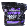 Saco de MuscleTech Mass Tech Extreme 2000, un ganador de masa de alta proteína. Contiene 80 g de proteína, 2,350 calorías y 21 vitaminas y minerales por porción. Sabor a brownie de chocolate triple, ideal para aumentar masa muscular y mejorar el rendimiento deportivo. Suplemento dietético de 5 lb (2.27 kg) para quienes buscan maximizar su ingesta calórica y proteica.