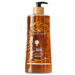 Botella de shampoo Natural Center de 700 ml, formulado sin sal y diseñado para cabellos tratados con keratina. Su presentación incluye un dispensador, lo que facilita su uso. Ideal para mantener el brillo y la salud del cabello, este shampoo es una opción perfecta para quienes buscan productos naturales y efectivos para el cuidado capilar.