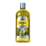 Botella de champú de manzanilla y miel de La Colmena. Formulado para cabellos claros, este champú contiene extractos de argán y biotina, ideal para nutrir y revitalizar el cabello. Su presentación es de 500 ml, ofreciendo una limpieza suave y eficaz que resalta el brillo natural y la suavidad del pelo. Perfecto para quienes buscan un producto natural que favorezca el cuidado capilar.