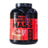 Envase de proteína en polvo Carnitech Mass de Athletica Nutrition, diseñado para aumentar la masa muscular. Contiene 50 gramos de proteína por porción, elaborada con proteína de carne de res 100% pura y sin lactosa. Ideal para deportistas y personas que buscan mejorar su rendimiento físico y recuperación muscular. Presentado en un bote negro con etiquetas en tonos rojos y detalles informativos sobre sus beneficios nutricionales.