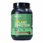 Envase de proteína vegetal de 100% de la marca Gold Standard, con 24 gramos de proteína por porción, 0 gramos de azúcar y 150 calorías. Sabor a chocolate rico. Ideal para dietas veganas y como suplemento nutricional.
