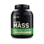 Envase de proteína en polvo Serious Mass de Optimum Nutrition, diseñado para aumentar masa muscular. Contiene 50 gramos de proteína por porción, 1,250 calorías y 251 gramos de carbohidratos. Sabor vainilla, ideal para quienes buscan un suplemento nutritivo para ganar peso y mejorar el rendimiento en el entrenamiento. Perfecto para deportistas y culturistas.