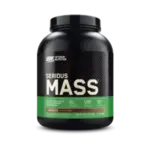 Suplemento de proteínas Serious Mass de Optimum Nutrition, ideal para el aumento de masa muscular. Contiene 50 gramos de proteína por porción y 1,260 calorías, diseñado para ayudar en la recuperación y crecimiento muscular. Sabor chocolate, disponible en envase de 2.27 kg, perfecto para atletas y personas activas que buscan optimizar su ingesta calórica y proteica.